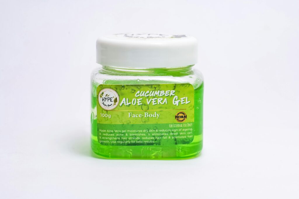Cucumber Aloe Vera gel in clear plastic jar on white background. Ideal for skincare routines.